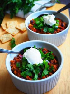 Bison-Chili-with-Beans-in-bowls-with-garnish