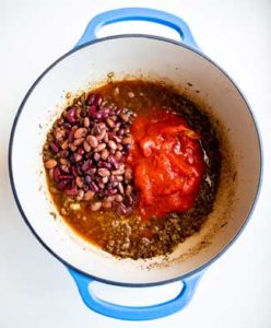 Meat, Beans and Tomatoes combined in Dutch Oven