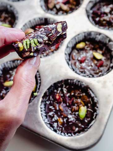 Goji-Berry-Pistachio-No-Bake-Cacao-Rounds in a muffin pan