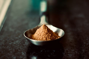 Cacao Powder in a table spoon