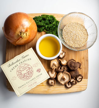 Ingredients-for-Mushroom-Quinoa-Salad displayed on a cutting board